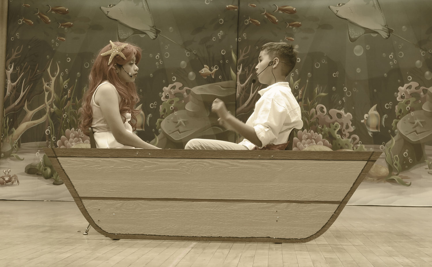 Students Acting Out A Scene in "The Little Mermaid" On stage