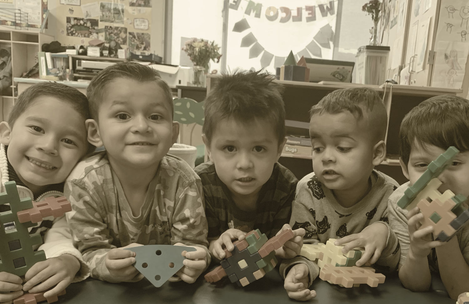 Young Boys Playing with Toys in Classroom