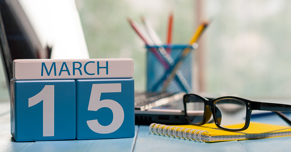 March 15 on a block calendar set on a desk