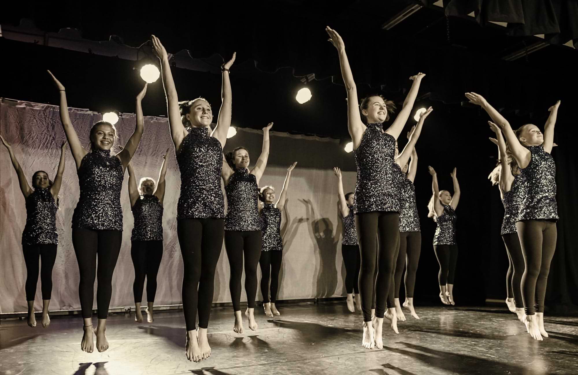 members of the Nordhoff High School Dance Program on stage performing