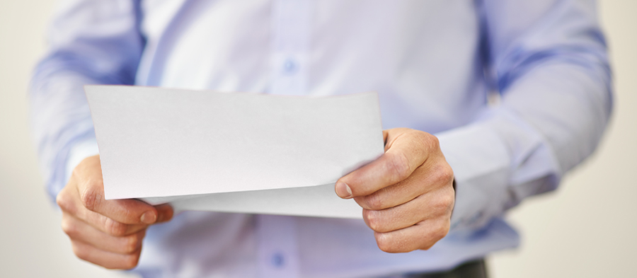 A man Holding a piece of paper