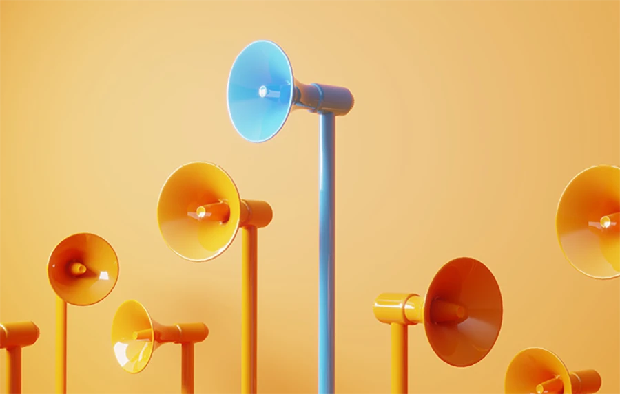 orange and blue megaphones against an orange backdrop