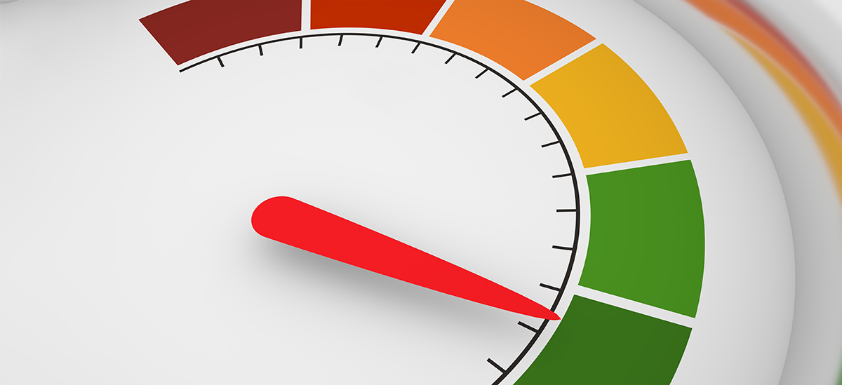 3D visual representation of a speedometer showing a dial containing dark red, lighter red, dark orange, light yellow/gold, lighter green, and dark green curved square-shape areas though the main highlight of this representation is featuring a red arrow pointing towards a black small tick mark all the way near the end of a dark green curved square-shaped area of the dial indicating a healthy good solid speed pace measurement