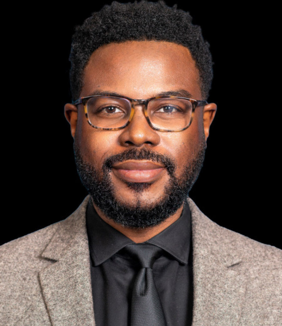 Portrait headshot close-up photograph view of D’Andre J. Weaver smiling