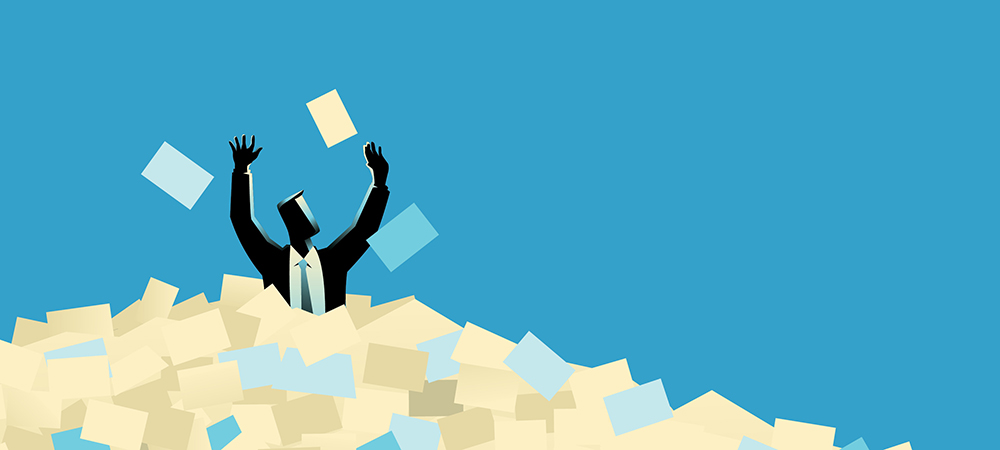 A person in a suit overwhelmed and drowning in a massive mountain of documents.