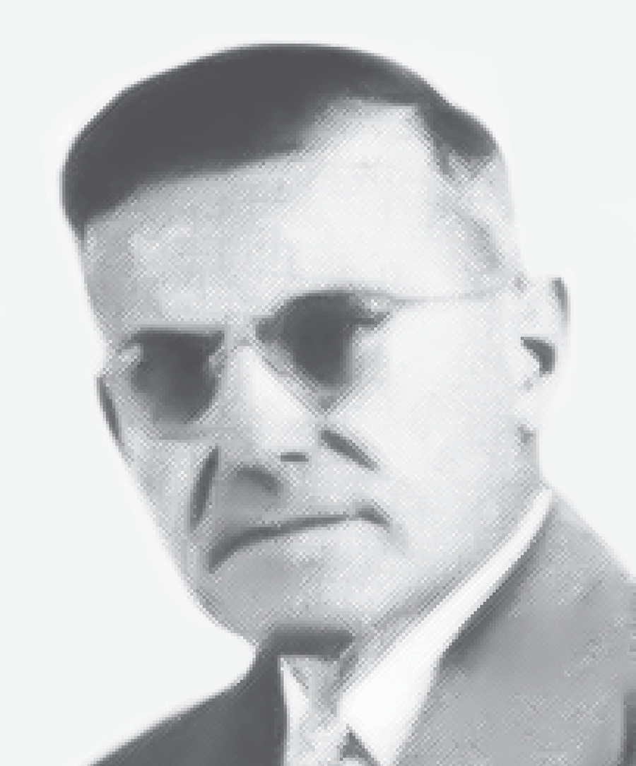 black and white headshot of R.E. Bosshard